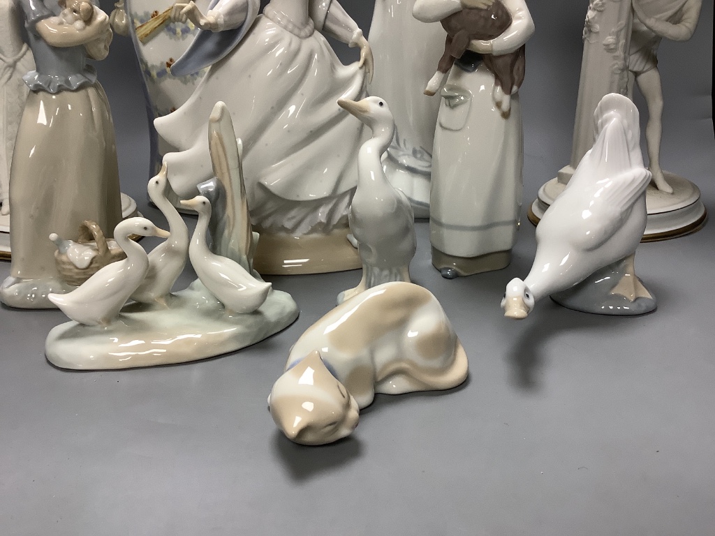 A quantity of Lladro, Nao and similar style figures